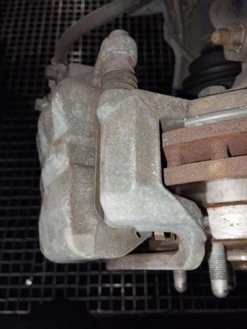 Jarzmo zacisku hamulcowego przedniego Opel Zafira P12