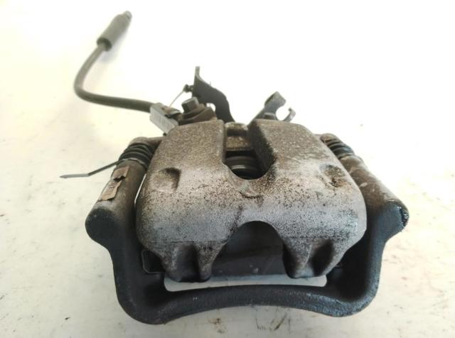 Zacisk hamulcowy tylny prawy 13390034 OPEL