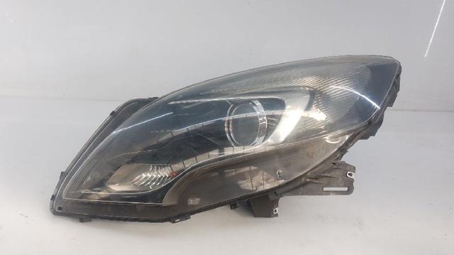 Reflektor lewy 13399858 OPEL