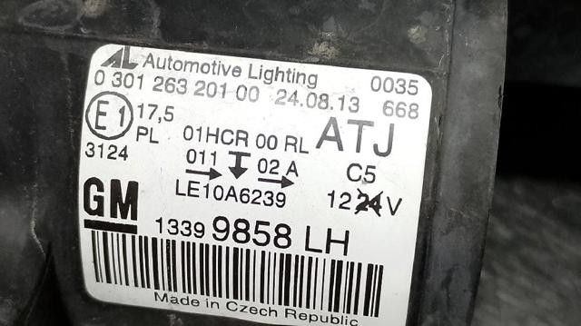 Reflektor lewy 13399858 OPEL