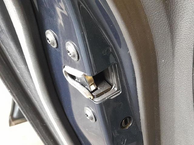 Zamek drzwi tylnych lewych 13579557 OPEL