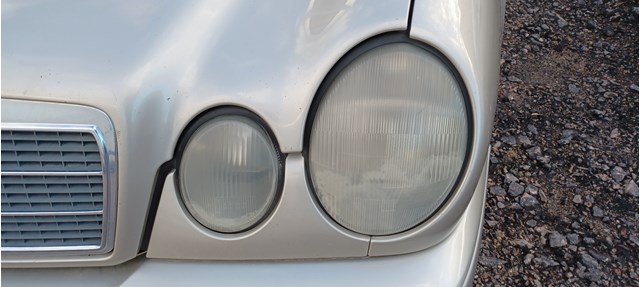 Reflektor lewy 144869 MERCEDES
