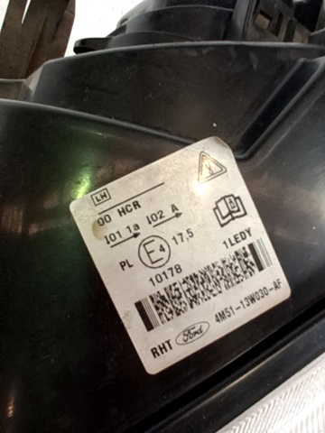 Reflektor lewy 1480990 FORD