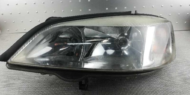 Reflektor lewy 148437 OPEL