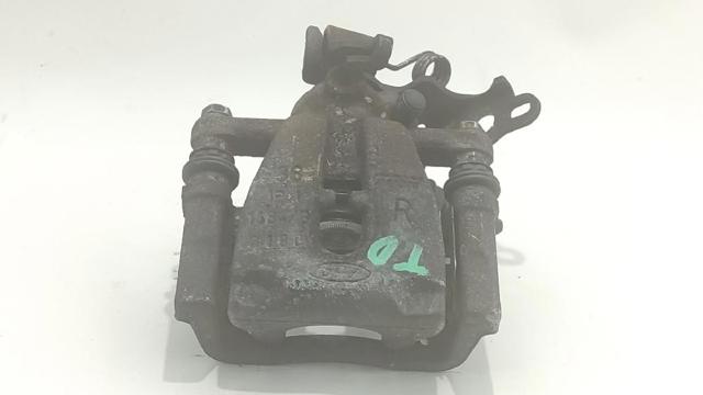 Zacisk hamulcowy tylny prawy 1502337 FORD