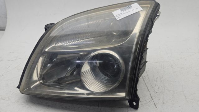 Reflektor lewy 15588700 OPEL