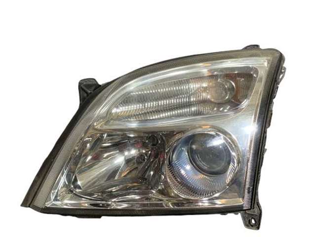Reflektor lewy 15588700 OPEL
