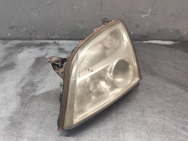 Reflektor lewy 15588700 OPEL