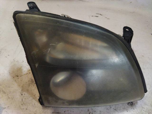 Reflektor prawy 15588800 OPEL