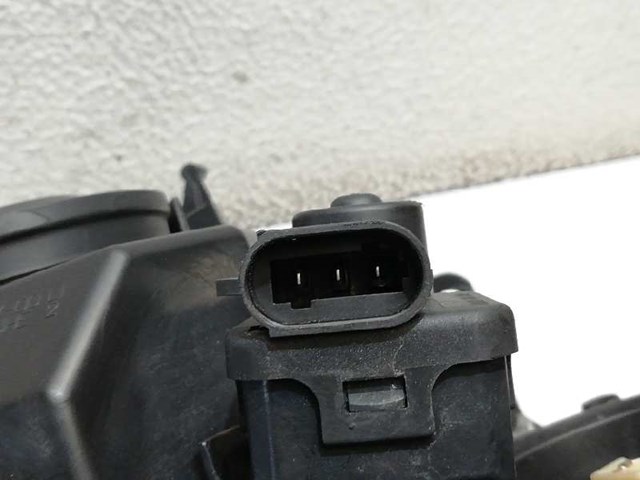 Reflektor lewy 15601700LI RENAULT