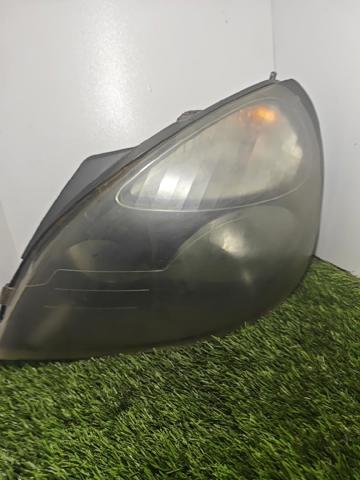 Reflektor lewy 15601700LI RENAULT