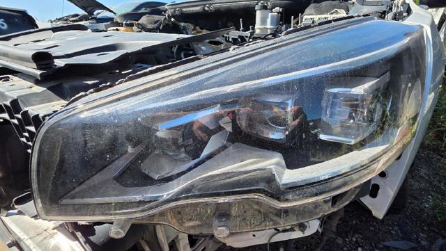 Reflektor lewy 1612495380 PEUGEOT