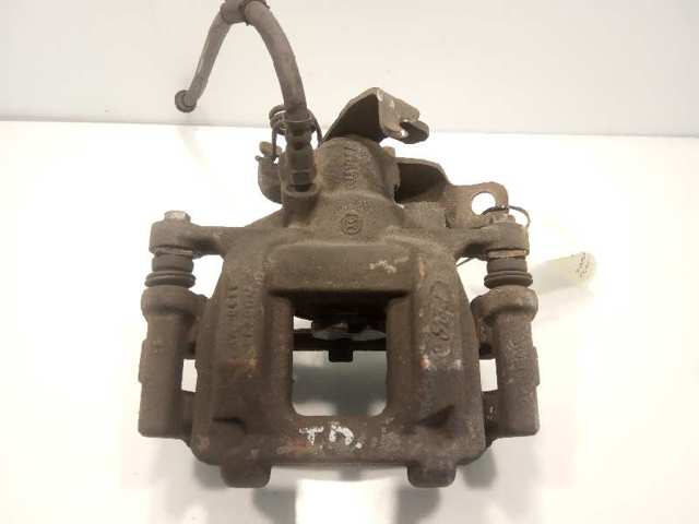 Zacisk hamulcowy tylny prawy 1843318 FORD