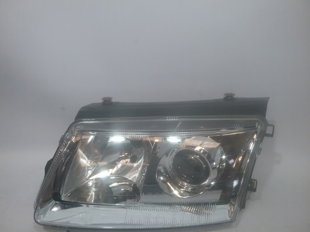 Reflektor lewy 1AF007850051 VAG