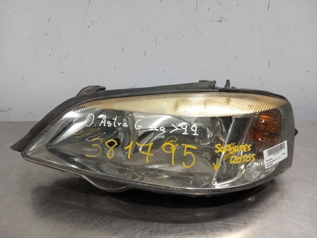 Reflektor lewy 1EG00764031 OPEL