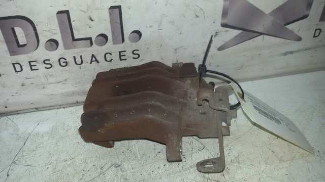 Zacisk hamulcowy tylny lewy 1J0615423B VAG