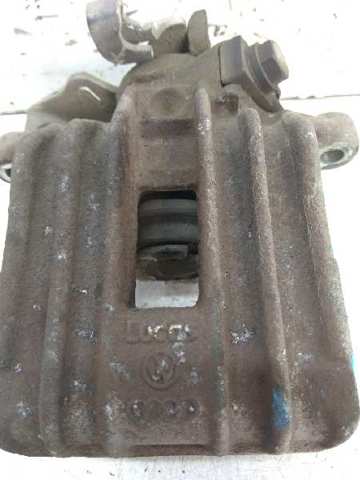 Zacisk hamulcowy tylny prawy 1J0615424H VAG