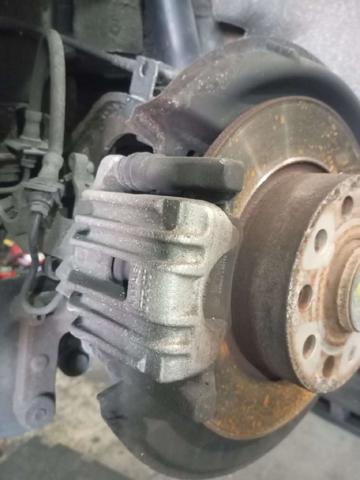 Zacisk hamulcowy tylny lewy 1K0615423G VAG