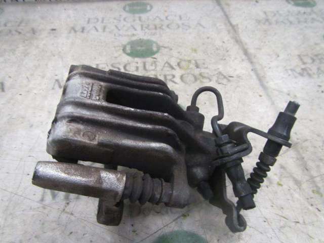 Zacisk hamulcowy tylny lewy 1K0615423J VAG