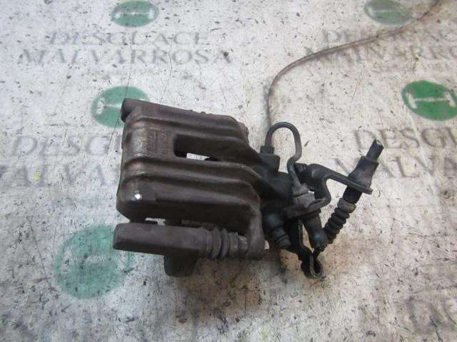 Zacisk hamulcowy tylny lewy 1K0615423J VAG