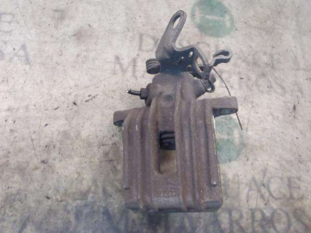 Zacisk hamulcowy tylny lewy 1K0615423J VAG
