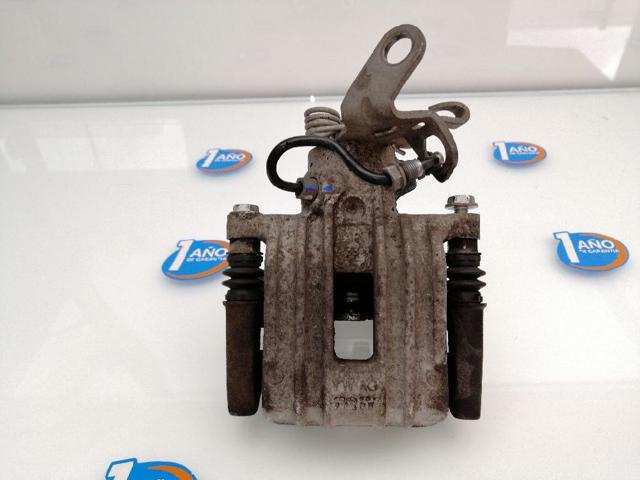 Zacisk hamulcowy tylny lewy 1K0615423J VAG