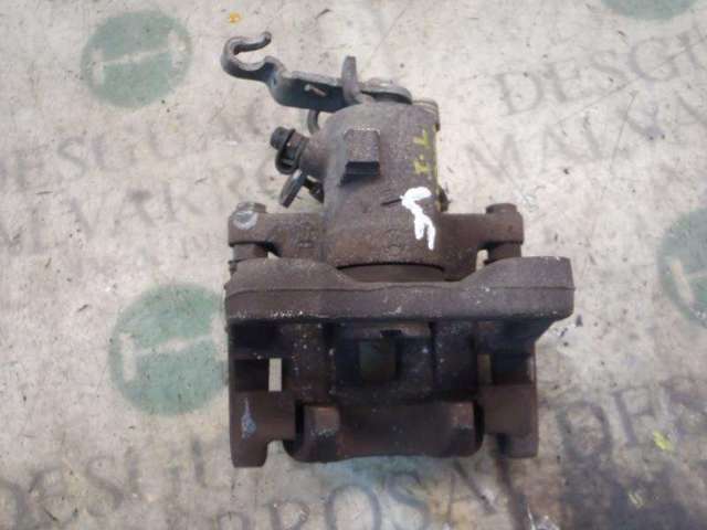 Zacisk hamulcowy tylny lewy 1K0615423J VAG