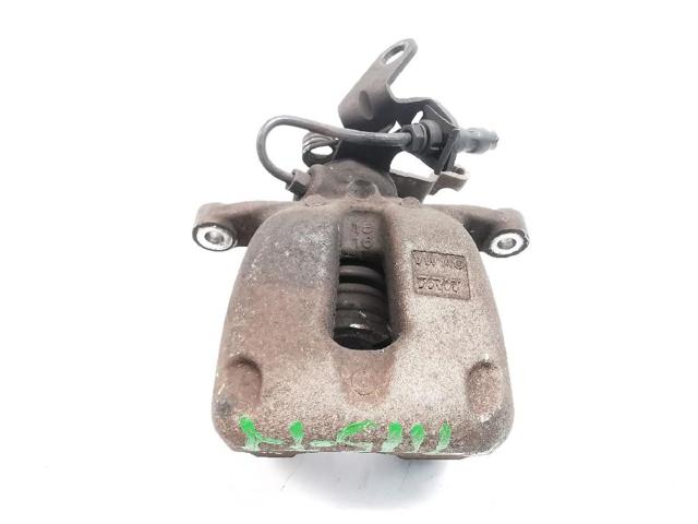 Zacisk hamulcowy tylny lewy 1K0615423M VAG