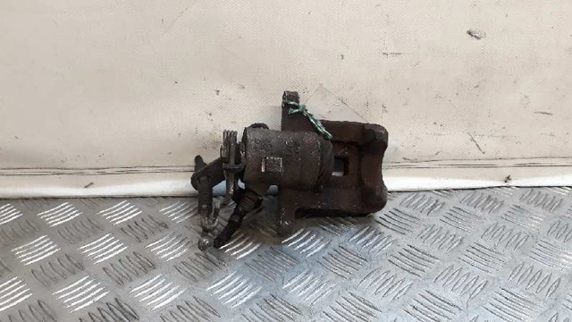 Zacisk hamulcowy tylny prawy 1K0615424J VAG