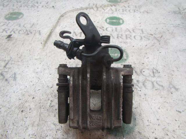 Zacisk hamulcowy tylny prawy 1K0615424J VAG