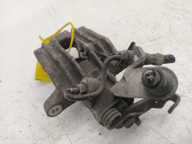 Zacisk hamulcowy tylny prawy 1K0615424J VAG