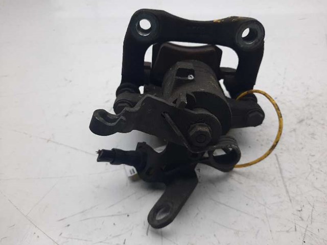 Zacisk hamulcowy tylny prawy 1K0615424J VAG