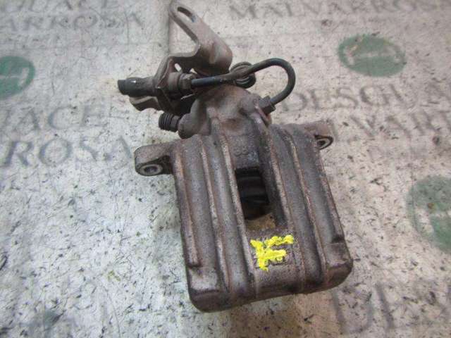 Zacisk hamulcowy tylny prawy 1K0615424J VAG