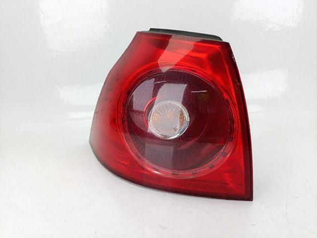 Lampa zespolona tylna lewa zewnętrzna 1K6945095AA VAG
