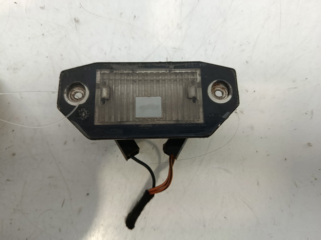 Lampa oświetlenia tylnej tablicy rejestracyjnej 1S7113550AC FORD