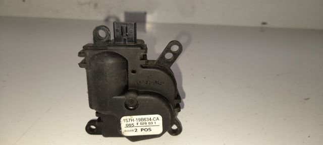 Silniczek klapy nagrzewnicy 1S7H19B634CA FORD