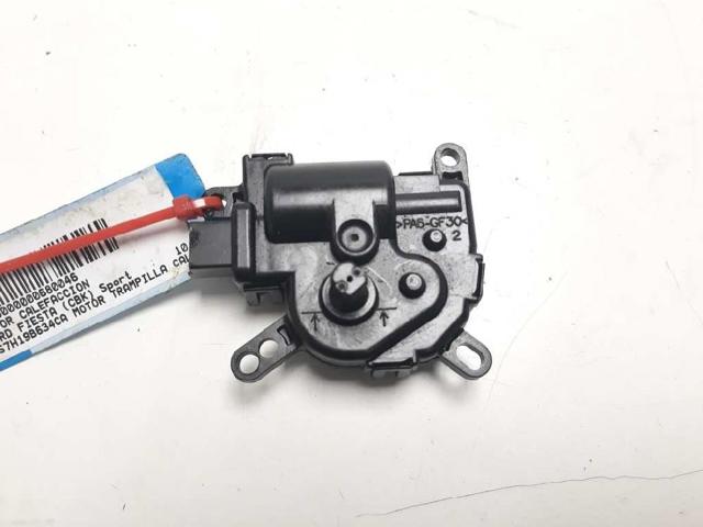 Silniczek klapy nagrzewnicy 1S7H19B634CA FORD