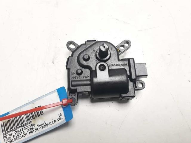 Silniczek klapy nagrzewnicy 1S7H19B634CA FORD