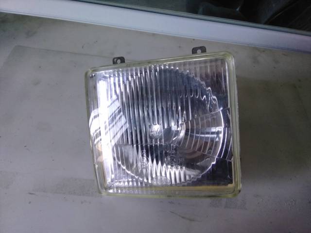 Reflektor lewy Mercedes 100 631