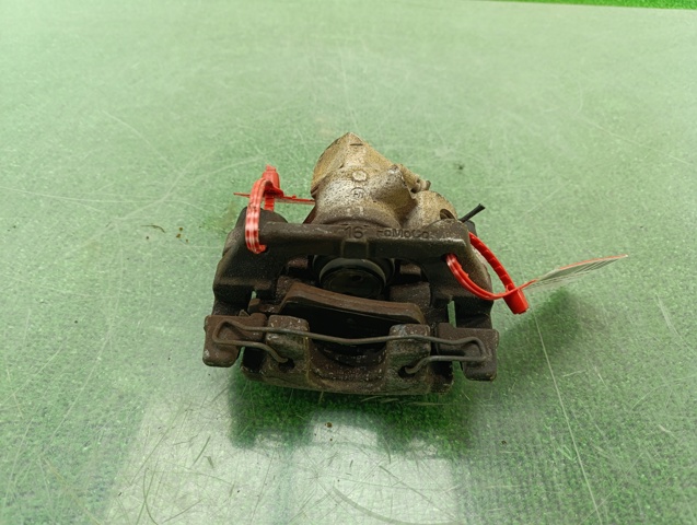Zacisk hamulcowy tylny prawy 2210213 FORD