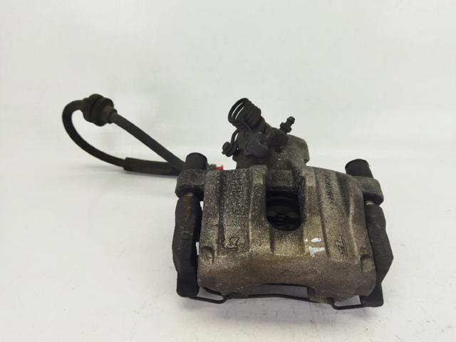 Zacisk hamulcowy tylny lewy 2210215 FORD