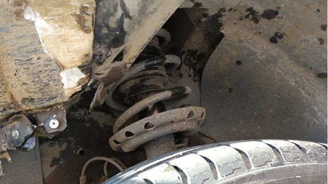 Amortyzator przedni lewy 22214597 OPEL