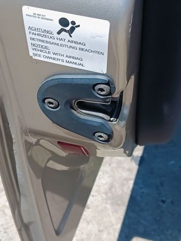 Zamek drzwi przednich lewych 24447340 OPEL