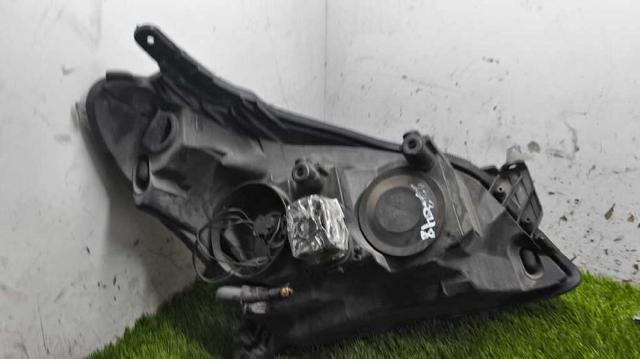 Reflektor lewy 24451032LH OPEL