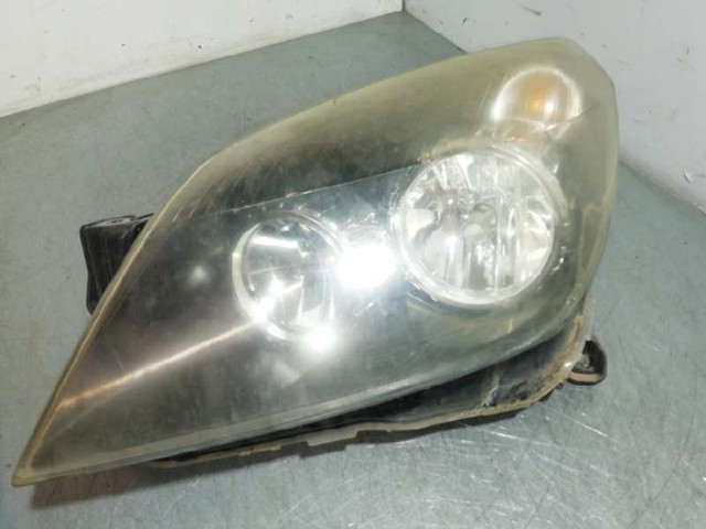 Reflektor lewy 24451032LH OPEL