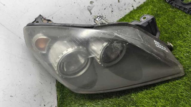 Reflektor prawy 24451033RH OPEL