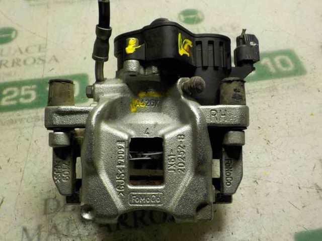 Zacisk hamulcowy tylny prawy 2494033 FORD