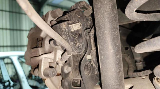 Zacisk hamulcowy tylny lewy Ford Focus 4 HP