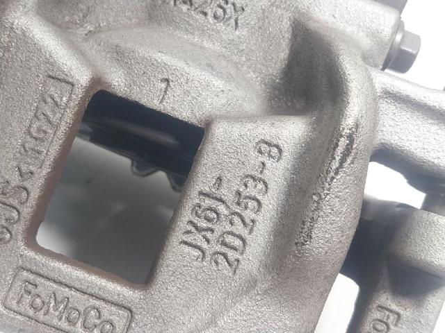 Zacisk hamulcowy tylny lewy Ford Focus 4 HP