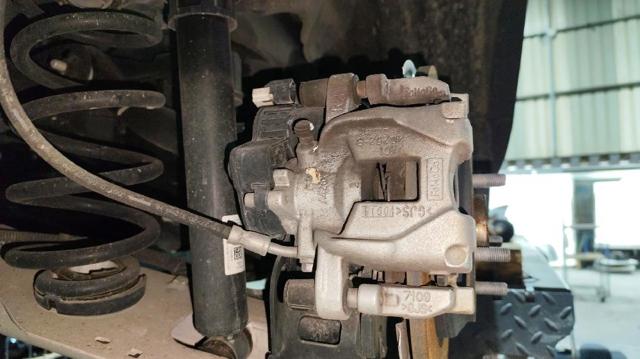 Zacisk hamulcowy tylny prawy Ford Focus 4 HP